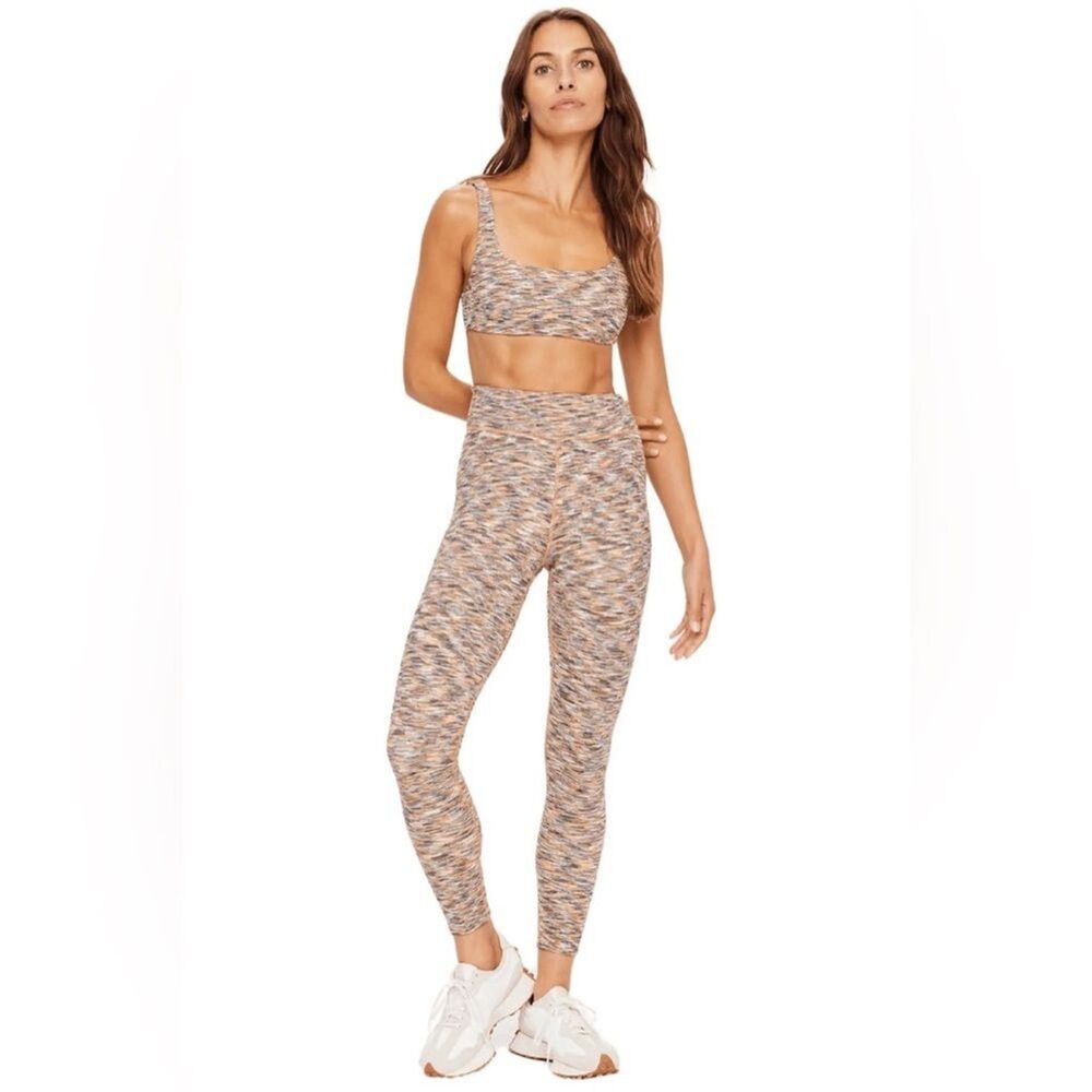 The Upside Nika Reversible multi color leggings size Medium urban outfitters